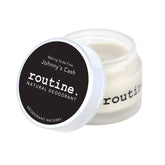 Routine Johnny's Cash deodorant jar opened showing smooth cream texture - baking soda free magnesium formula for extra sensitive skin with woodsy masculine scent